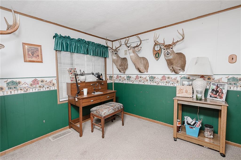 478 Exton Lake Road Apollo, PA 15613 - Photo 7 of 25 a room with furniture and a fireplace