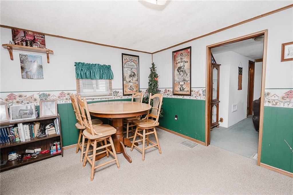 478 Exton Lake Road Apollo, PA 15613 - Photo 8 of 25 a dining room with furniture and a window