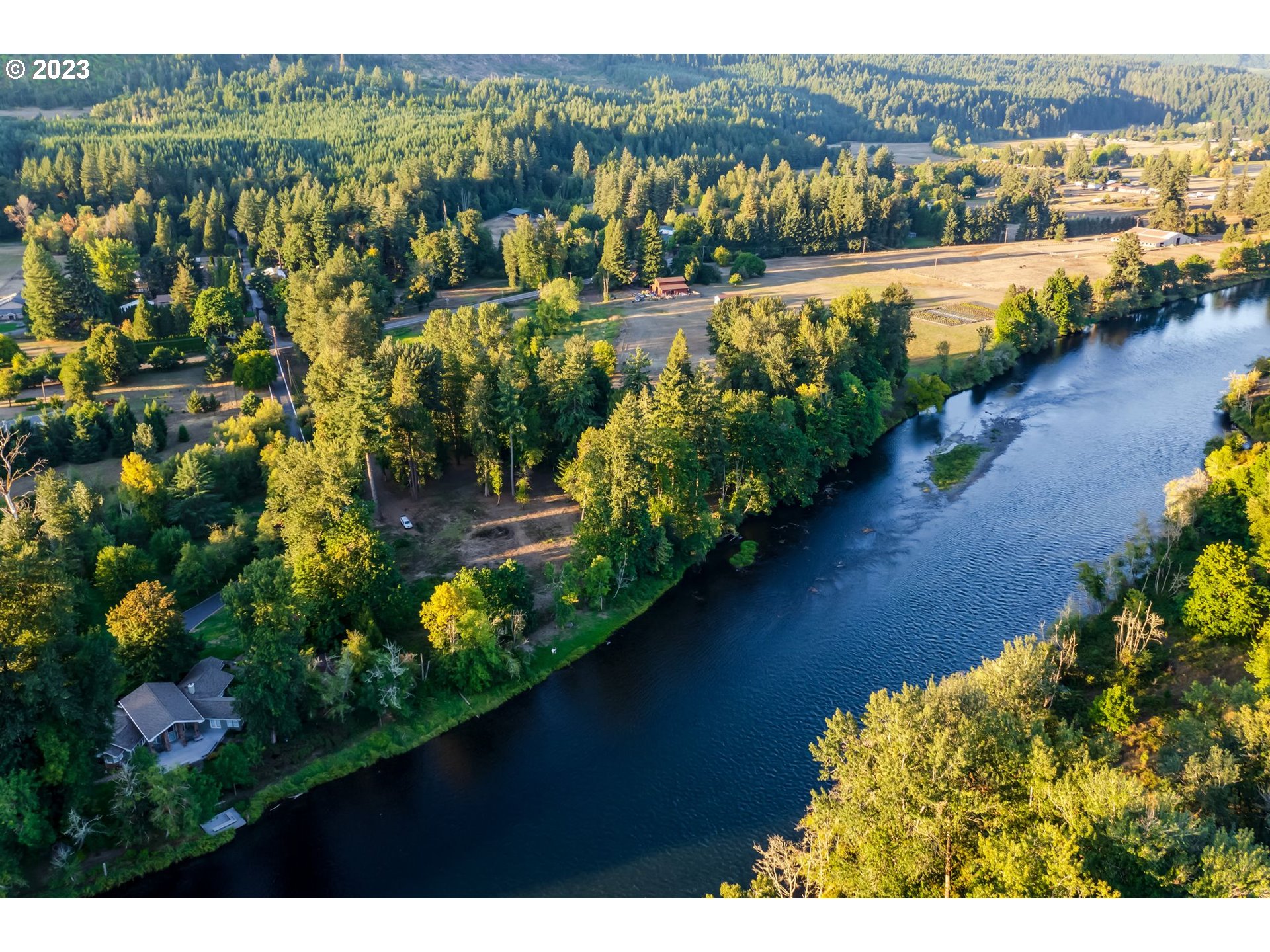 Mckenzie Highway Springfield, OR 97478 - Photo 12 of 29 a view of a city with lush green forest