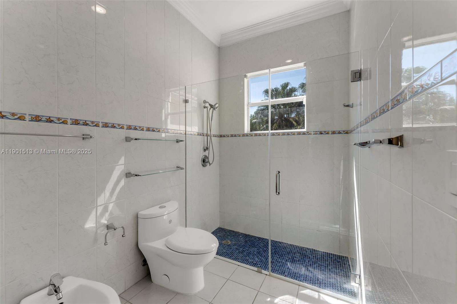 14950 Southwest 179th Avenue Miami, FL 33196 - Photo 39 of 55 a bathroom with a granite countertop toilet a sink and shower