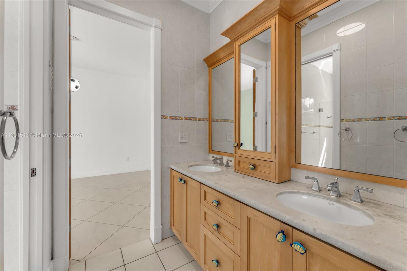 14950 Southwest 179th Avenue Miami, FL 33196 - Photo 41 of 55 a bathroom with a double vanity sink mirror and double