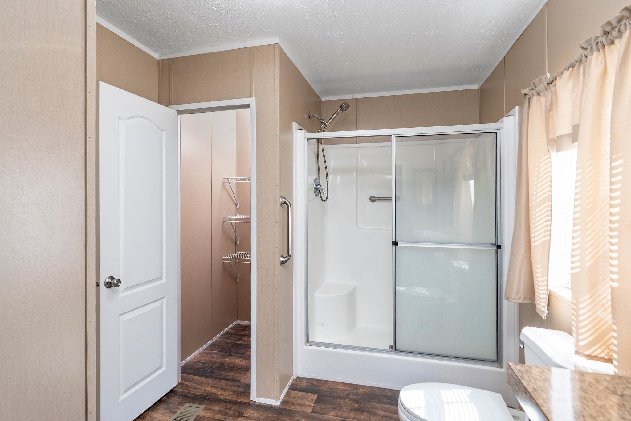 2061 Cecil Wampler Road Mount Crawford, VA 22841 - Photo 37 of 70 a bathroom with a shower and a toilet