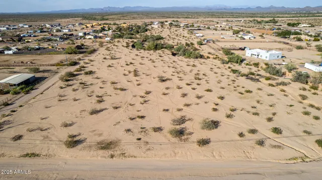 a view of outdoor space with wooden floor