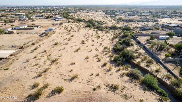 a view of outdoor space and a yard