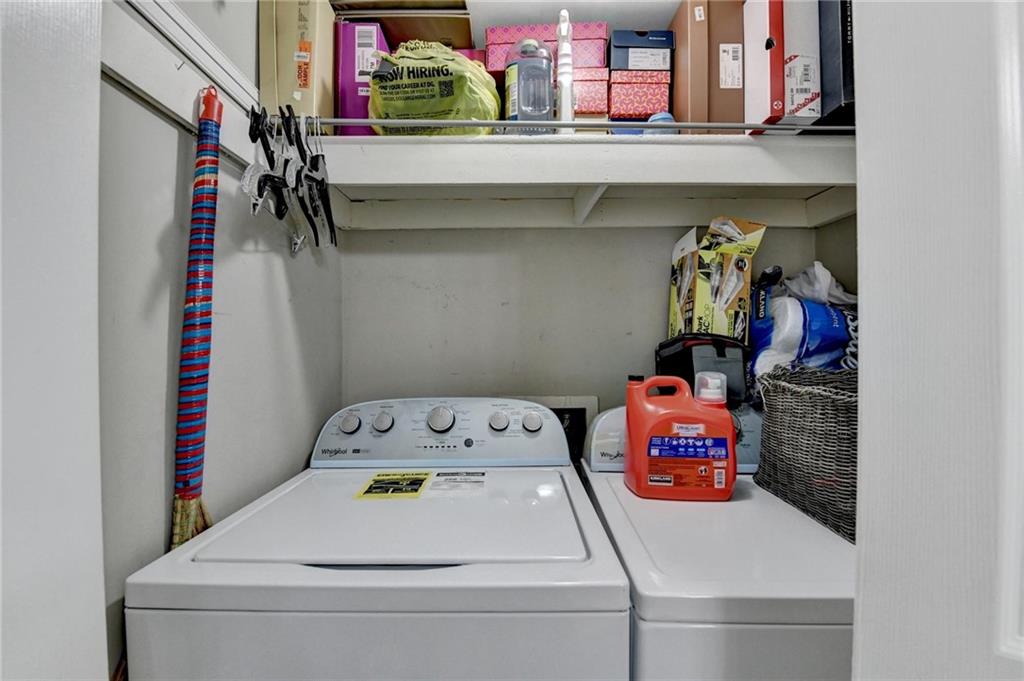 992 Old Holcomb Bridge Road Roswell, GA 30076 - Photo 19 of 34 a utility room with dryer and washer
