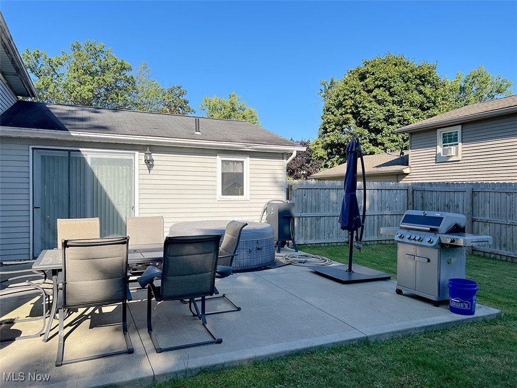 613 Guilford Road Vermilion, OH 44089 - Photo 25 of 26 View of patio / terrace featuring area for grilling and outdoor dining area