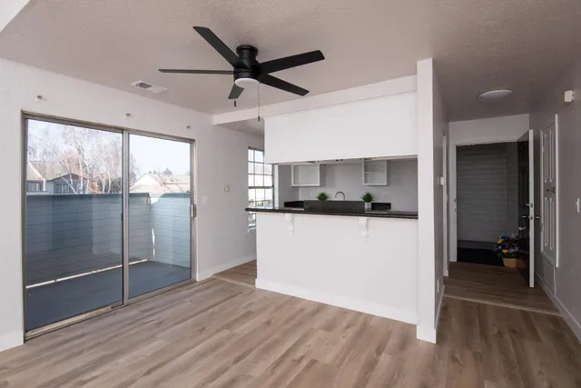 a view of a kitchen from the hallway