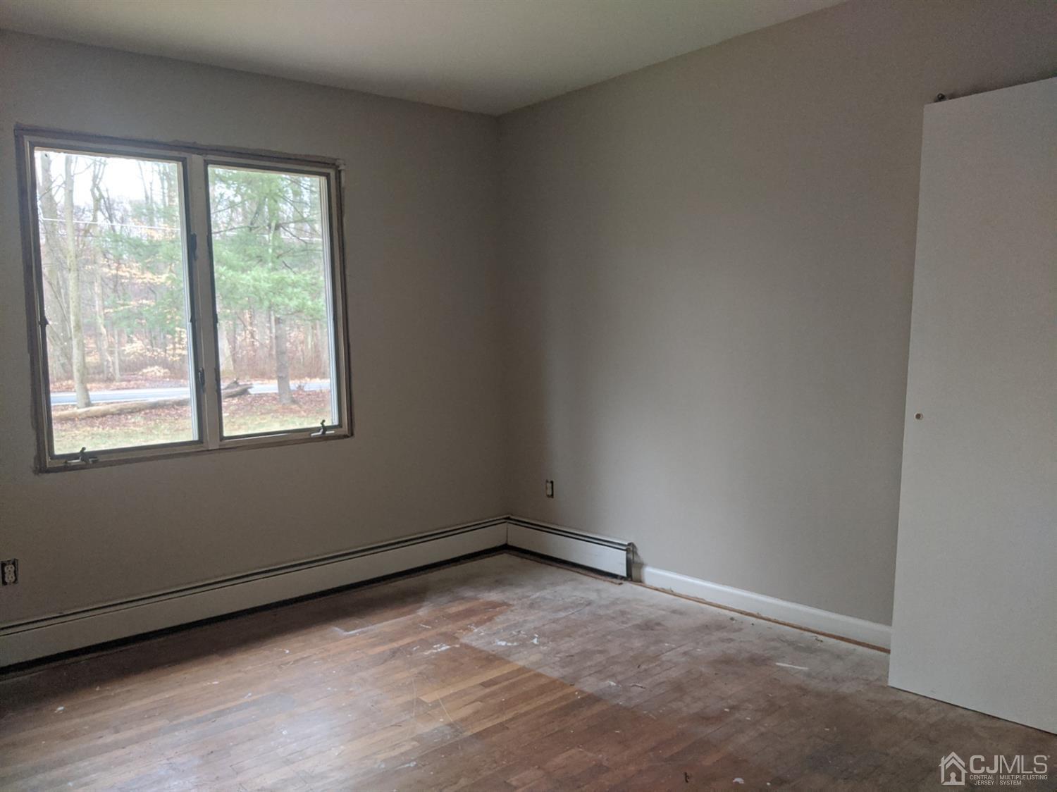 154 Broadway Road Cranbury, NJ 08512 - Photo 7 of 15 an empty room with a window
