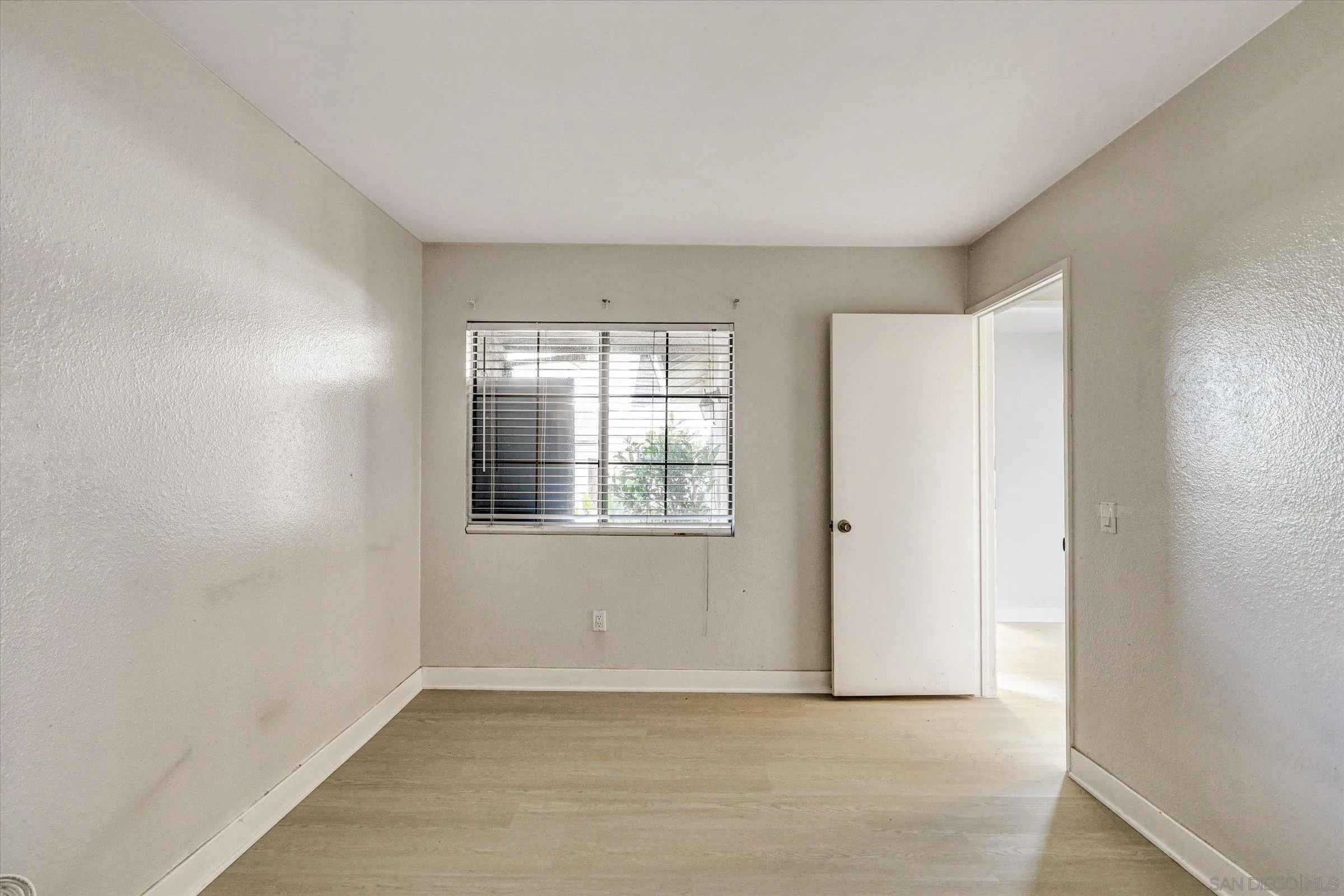 9488 Hiker Hill Road San Diego, CA 92129 - Photo 26 of 27 an empty room with windows