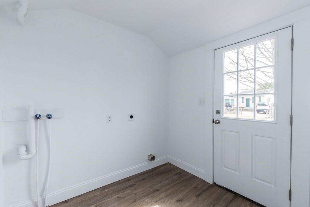 9 Camp Street Wareham, MA 02558 - Photo 30 of 30 an empty room with wooden floor and windows