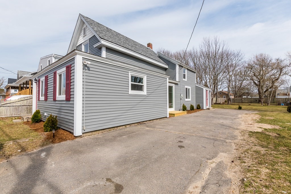 9 Camp Street Wareham, MA 02558 - Photo 4 of 30 a view of a house with a yard
