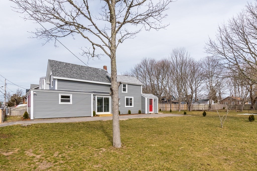 9 Camp Street Wareham, MA 02558 - Photo 7 of 30 a front view of house with yard space and trees