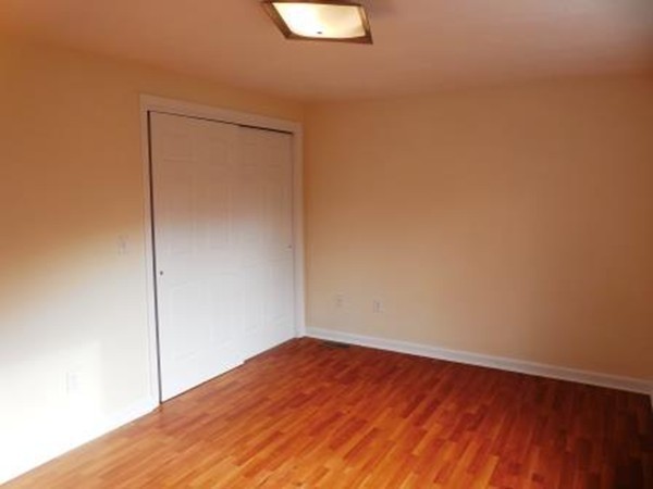 5 Kingsbury Road Webster, MA 01570 - Photo 11 of 29 a view of a room with wooden floor