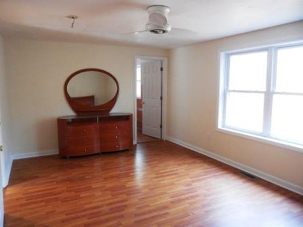 5 Kingsbury Road Webster, MA 01570 - Photo 13 of 29 a living room with furniture and a large window