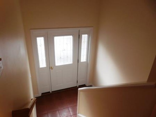 5 Kingsbury Road Webster, MA 01570 - Photo 17 of 29 an empty room with wooden floor and windows