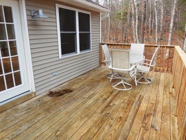 5 Kingsbury Road Webster, MA 01570 - Photo 22 of 29 a view of a chairs and table on the wooden floor