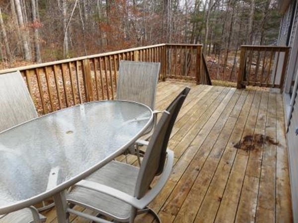 5 Kingsbury Road Webster, MA 01570 - Photo 23 of 29 a view of balcony with wooden floor and outdoor seating