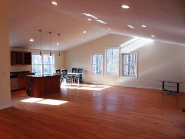 5 Kingsbury Road Webster, MA 01570 - Photo 3 of 29 a view of empty room with wooden floor and windows