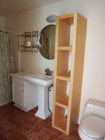 5 Kingsbury Road Webster, MA 01570 - Photo 9 of 29 a bathroom with a sink and mirror with toilet