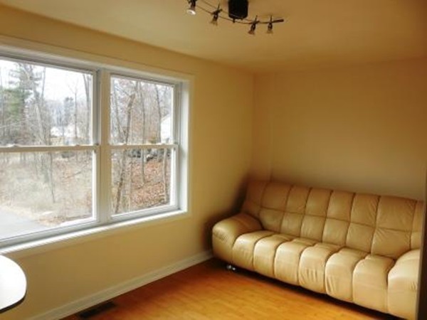5 Kingsbury Road Webster, MA 01570 - Photo 10 of 29 a living room with furniture and a window