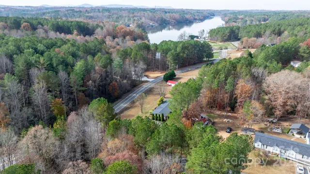 an aerial view of residential house with outdoor space