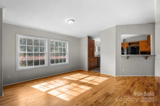a view of an empty room and window