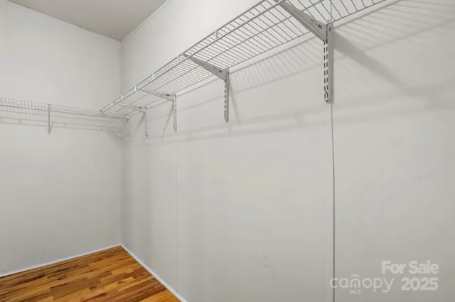 a view of small space with racks on the wall