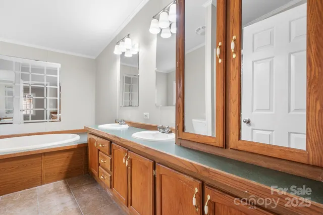 a bathroom with a bathtub and a sink