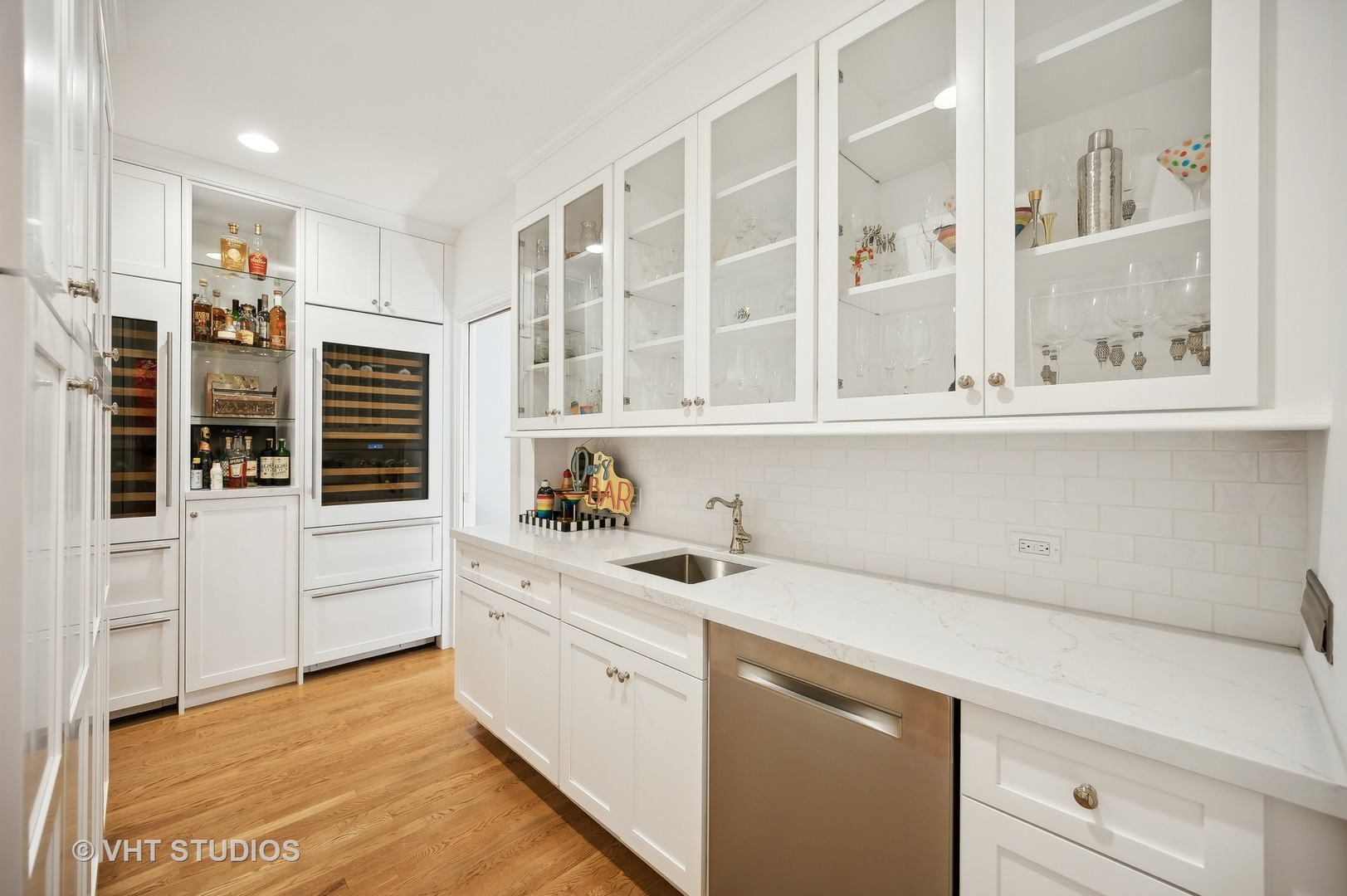 1015 Sheridan Road Glencoe, IL 60022 - Photo 12 of 29 a view of cabinets a sink and a stove in a kitchen