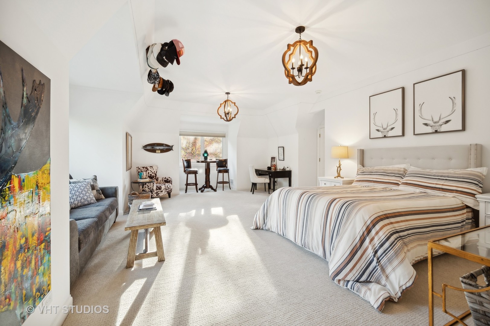 1015 Sheridan Road Glencoe, IL 60022 - Photo 17 of 29 a spacious bedroom with a bed and a chandelier