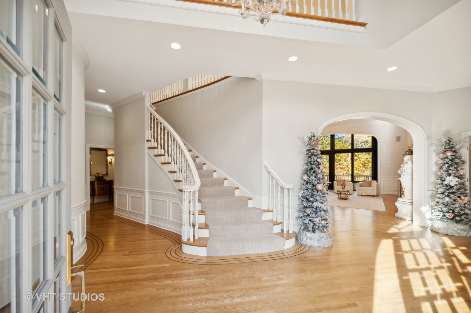 1015 Sheridan Road Glencoe, IL 60022 - Photo 3 of 29 a view of entryway and hall with wooden floor