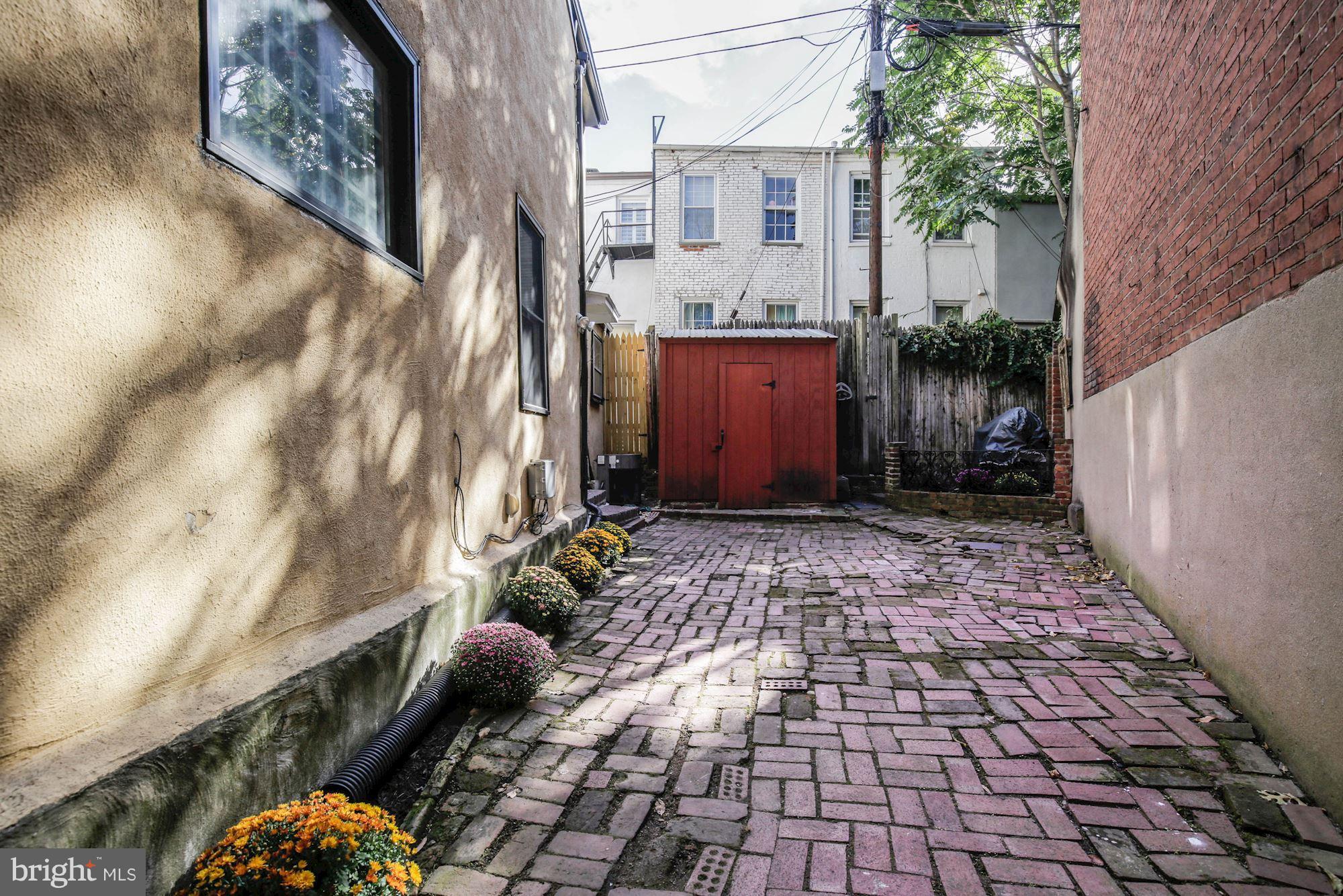 1341 Vermont Avenue Northwest Washington, DC 20005 - Photo 18 of 29 a view of a pathway along with potted plants