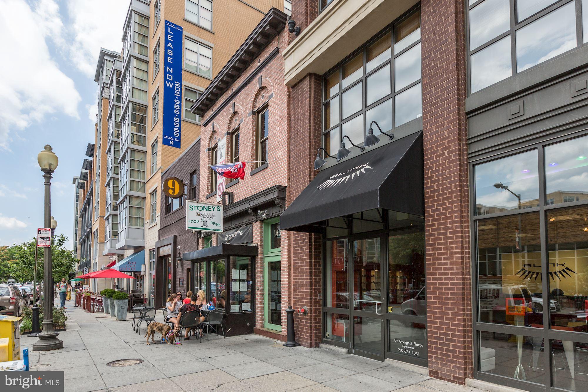 1341 Vermont Avenue Northwest Washington, DC 20005 - Photo 22 of 29 a view of shops on a street