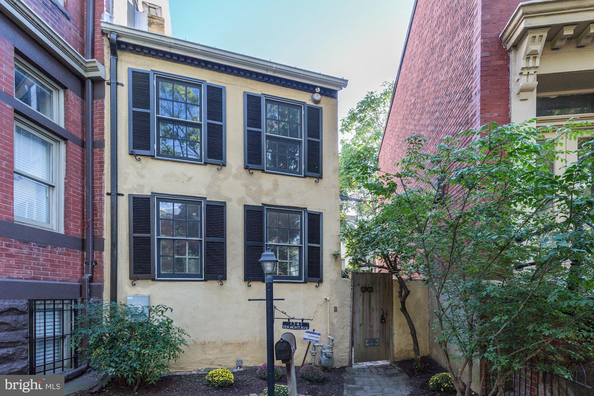 1341 Vermont Avenue Northwest Washington, DC 20005 - Photo 28 of 29 a view of a building with a yard