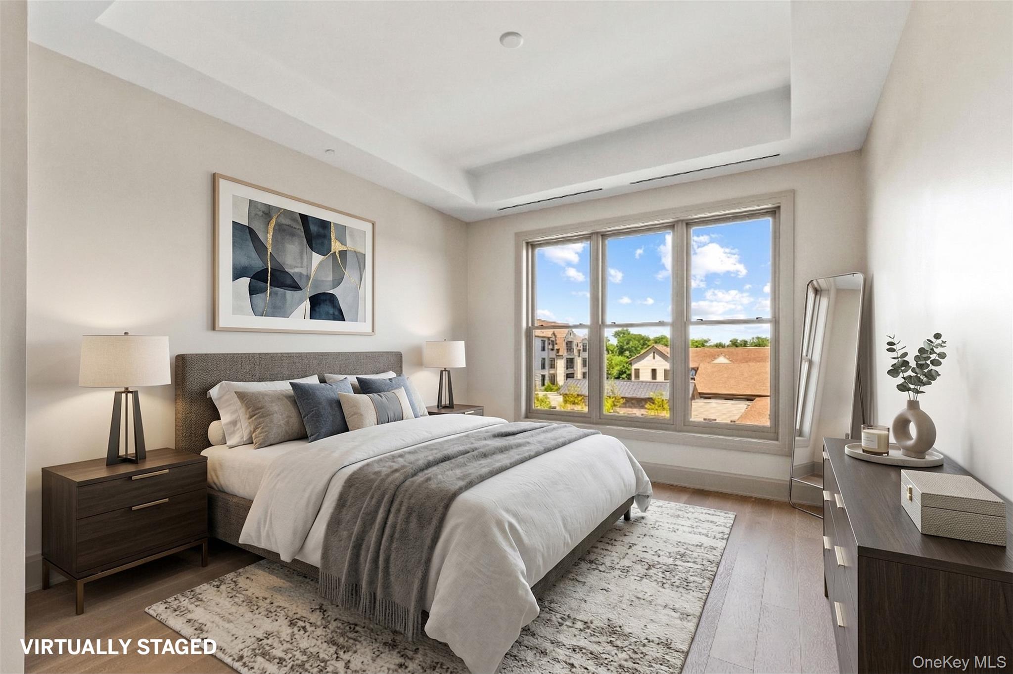 120 Old Post Road, Unit PHE303 Rye, NY 10580 - Photo 8 of 29 a bedroom with a large bed and a window