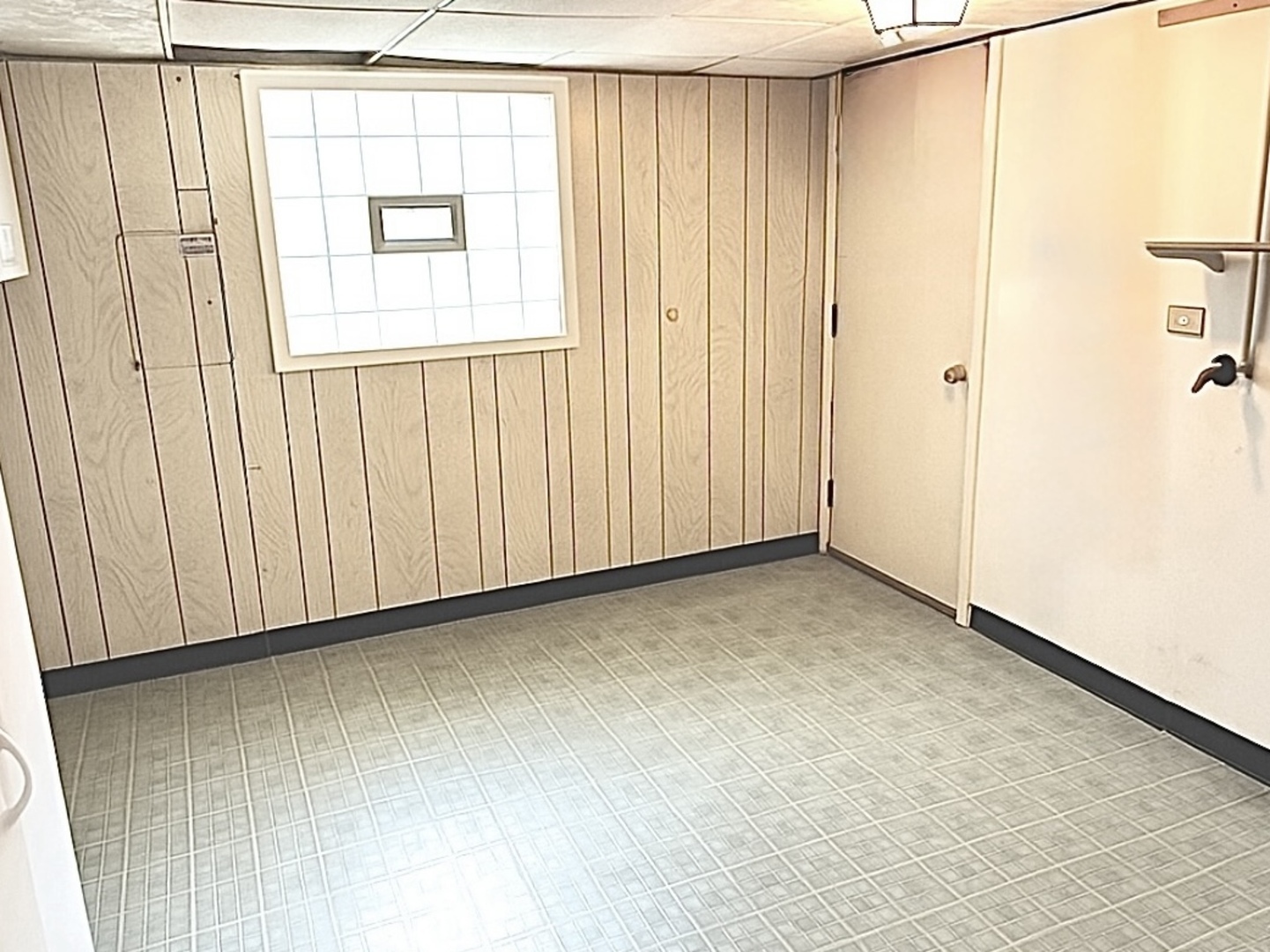 1408 Spruce Lane Westmont, IL 60559 - Photo 24 of 25 a view of an empty room with a window