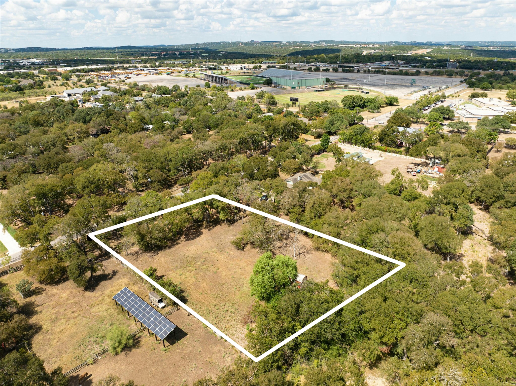 7 Pillow Road Sunset Valley, TX 78745 - Photo 20 of 22 a view of a pool with a yard