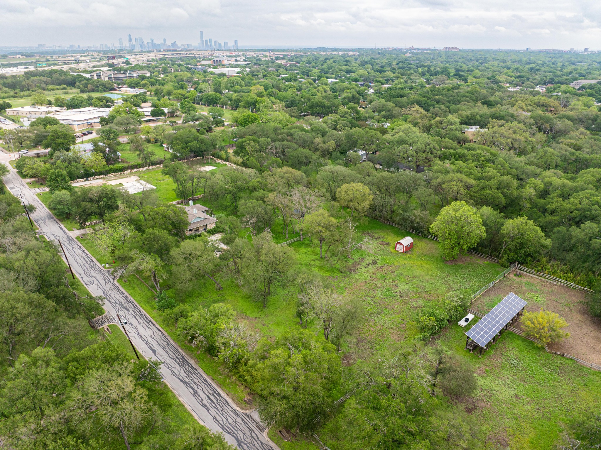 7 Pillow Road Sunset Valley, TX 78745 - Photo 2 of 22 a view of a yard with an outdoor seating