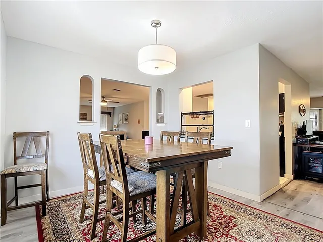 a view of a dining room with furniture
