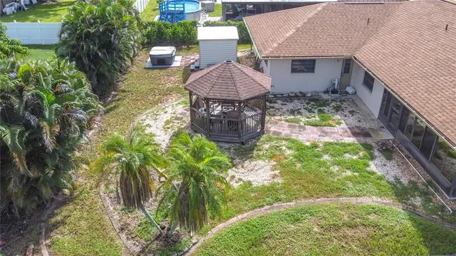a house view with a garden space