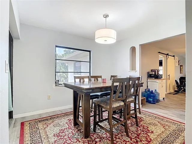 a view of a dining room with furniture