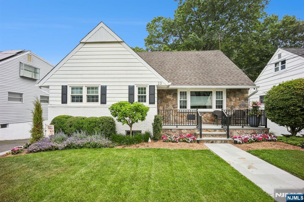 23 Andover Place Bloomfield, NJ 07003 - Photo 1 of 42 a view of a house with a yard and sitting area