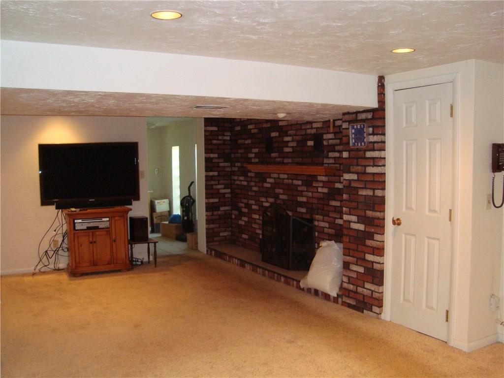 707 Center Road Pittsburgh, PA 15239 - Photo 10 of 14 Family room with gas fireplace