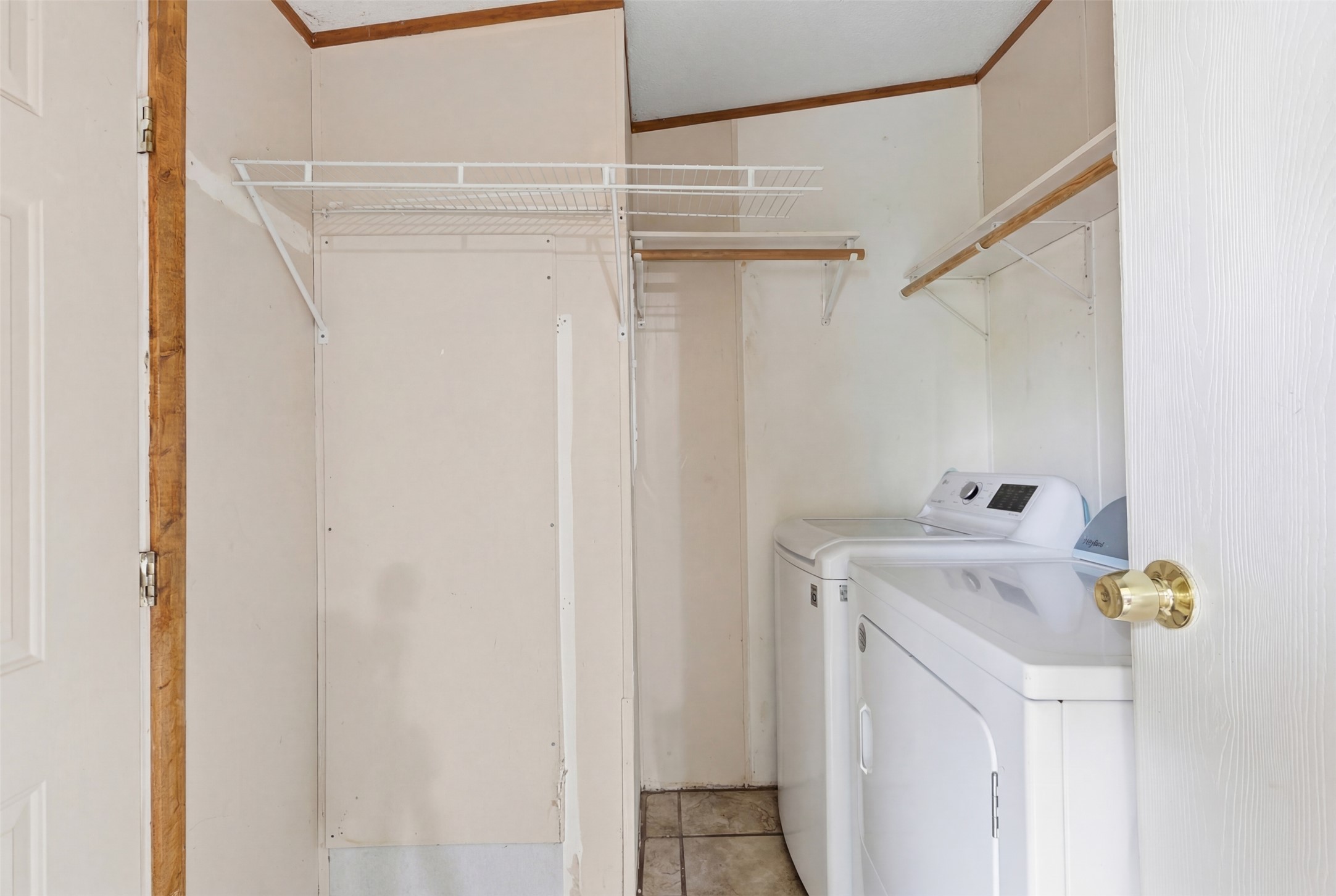 1150 Walter Hoffman Road Cedar Creek, TX 78612 - Photo 11 of 25 Laundry area featuring independent washer and dryer