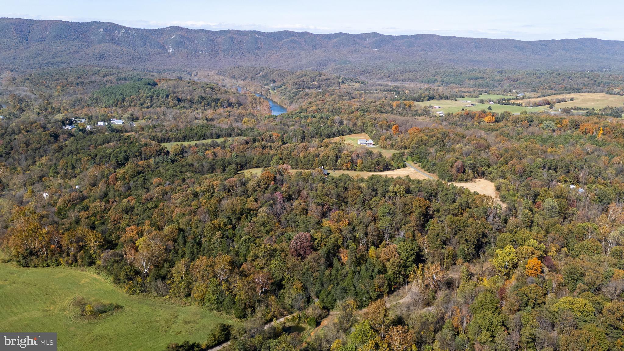 1-2 Young Road Rileyville, VA 22650 - Photo 7 of 16 a view of a lush green hillside and a houses