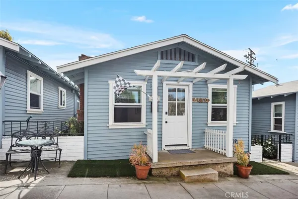 a front view of a house with a porch