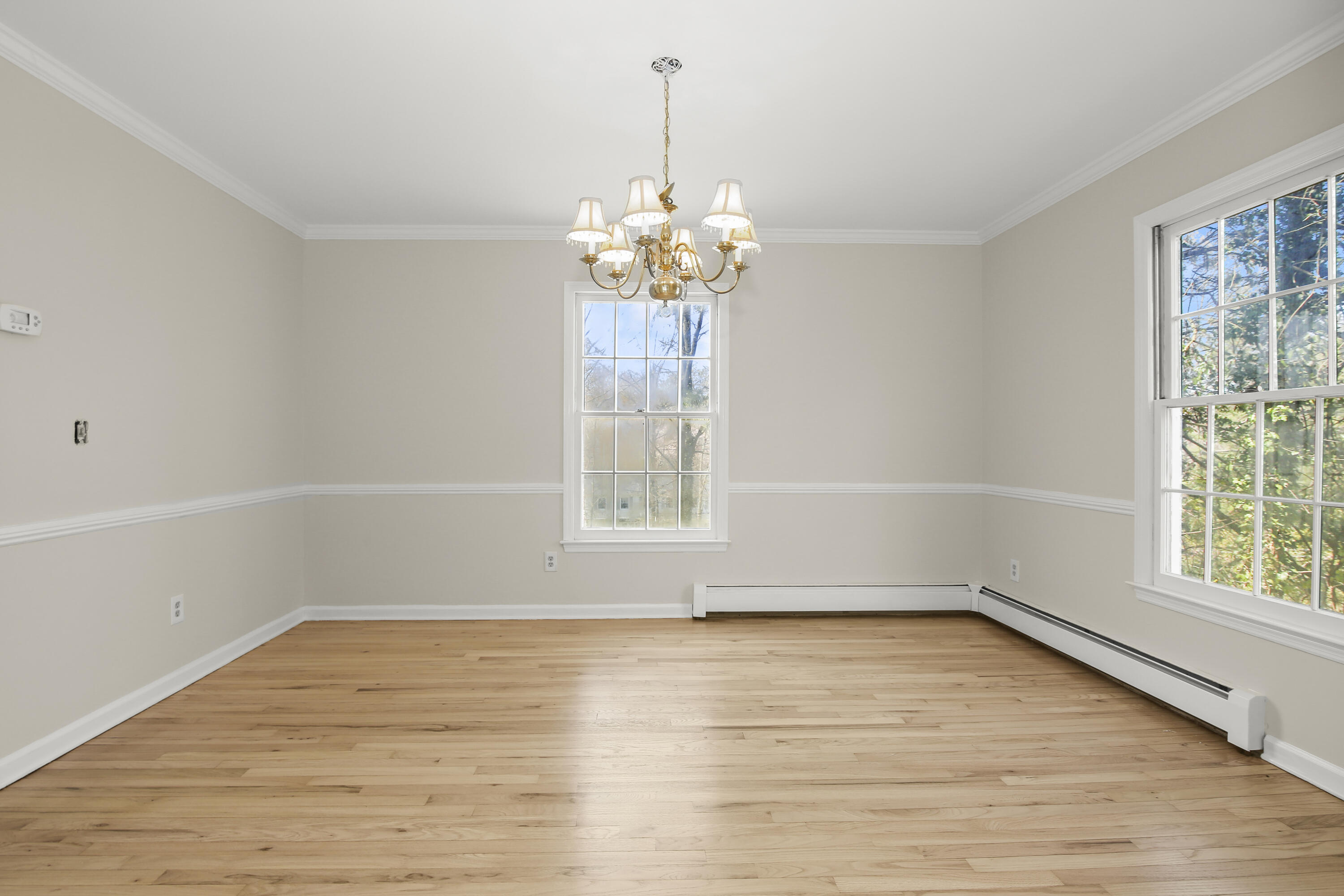 5 Barringer Road Darien, CT 06820 - Photo 18 of 39 a view of a room with wooden floor and a window