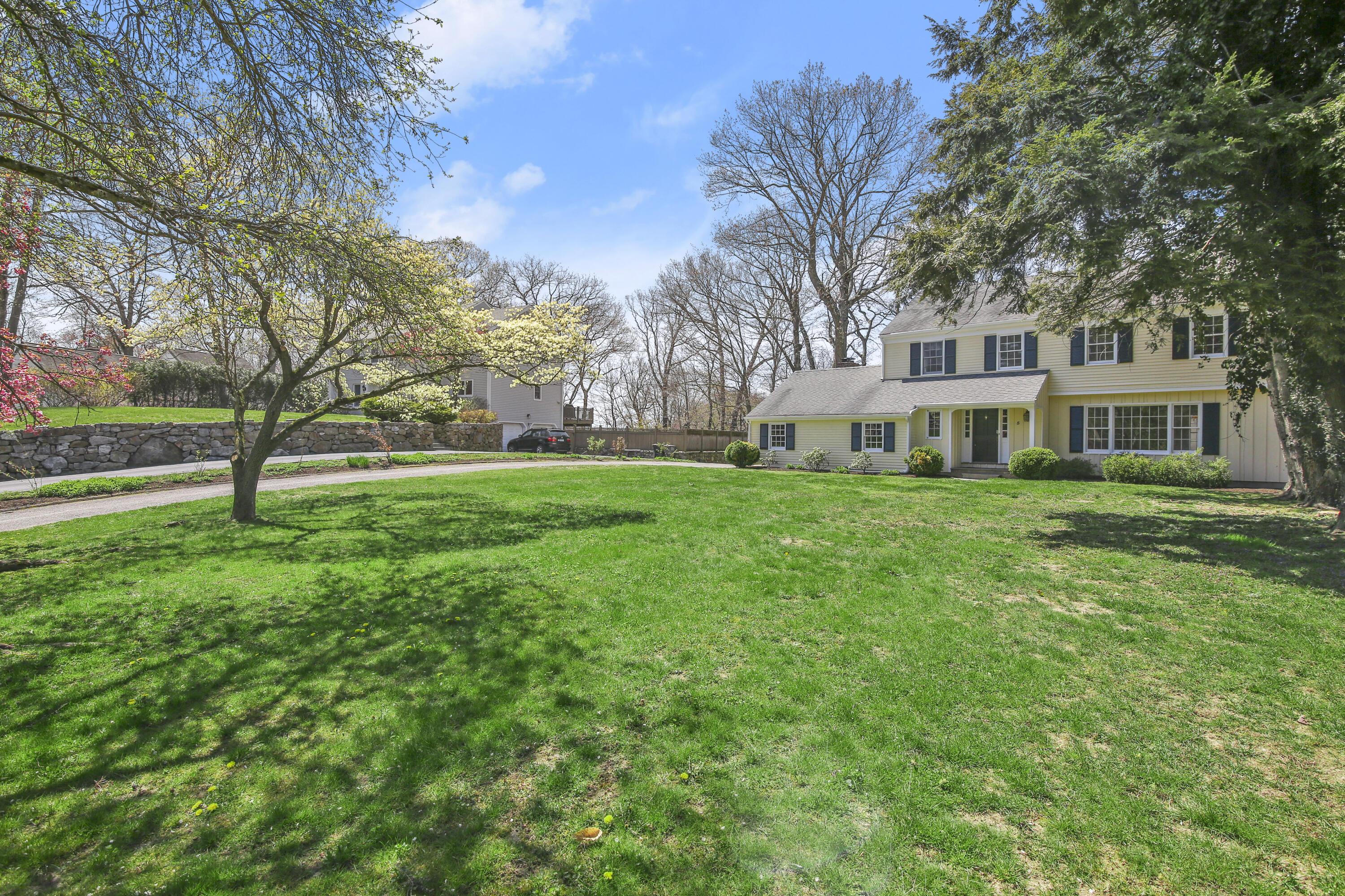 5 Barringer Road Darien, CT 06820 - Photo 3 of 39 a view of a house with a big yard