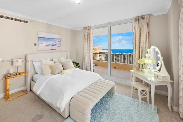 a bedroom with a bed and a table