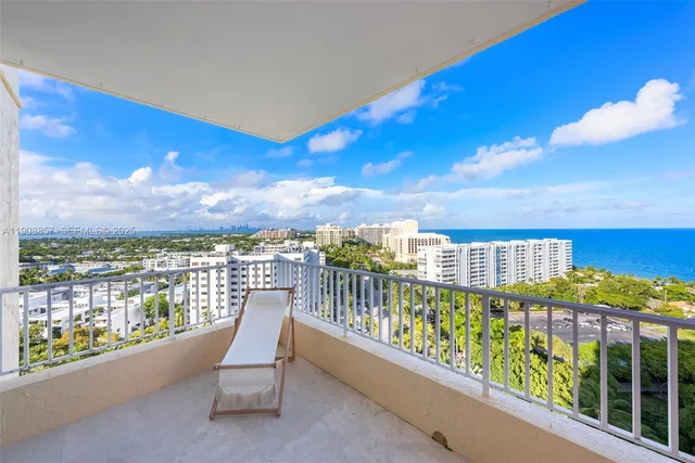 a view of a balcony with city view